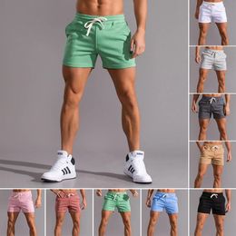 Shorts de sport décontractés d'été pour hommes, poches à séchage rapide, shorts en coton, gym, course à pied, plage, fitness, vêtements de marque pour hommes 4XL 240223