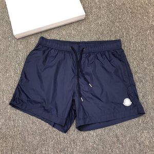 Diseñador de verano Moncleer Shorts para hombre Swimwear Womens Beach Pantra corta Marca francesa Etiqueta bordada Sports de secado rápido 842
