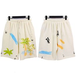Shorts de créateurs d'été Pantalons de plage pour hommes Hommes Femmes Mode Cocotier Lettre Imprimer Shorts Pantalons de survêtement déchirés en vrac