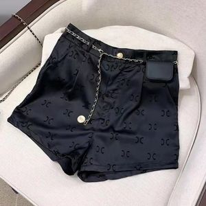 Designer d'été femmes shorts de sport pantalons chauds tissu de soie de glace mince short de costume de luxe noir taille basse