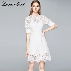 Été élégant femmes broderie évider pur blanc dentelle femme Vintage demi manches bureau OL Mini robe Vestidos 210416