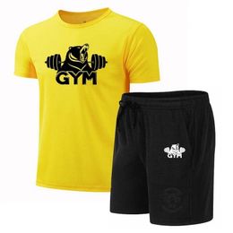 Zomer mode fitness elastisch pak heren casual sportkleding ademende gedrukte shortsleeved t -shirt shorts 2 -piece set s4XL 240529