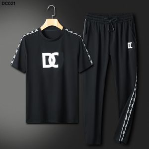 Mode d'été hommes et femmes Shorts ensembles de survêtement à manches courtes 100% coton noir t-shirt Shorts imprimés ensemble masculin vêtements de marque pour hommes # D-G # 1