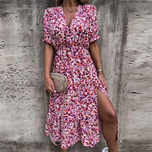 Zomer bloemenprintjurk vrouwen sexy v nek zijspleet elegante lange vrouwelijke casual korte mouw knop feestvestidos 220521