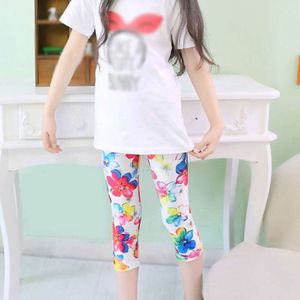 Zomermeisjes Zevenpuntige kleurrijke hoge elasticiteit Ademend leggings met bloemenprint zachte huidvriendelijke broek L2405