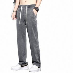 Verano de alta calidad Lyocell tela jeans hombres sueltos rectos delgados cintura elástica casual pantalones de mezclilla pantalones grises tamaño grande M-5XL M8Ha #