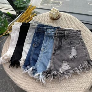 Summer High Tassel Hole Denim Shorts Femmes coréennes Version coréenne Edge large jambe lâche noir Bleu Jean Femme 240415