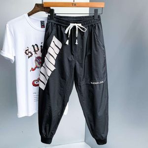 Zomer jog Ultradunne ijs zijden werkkleding met enkelbeschermers herentrend los straatbasketbalsporten Casual heren joggers broek