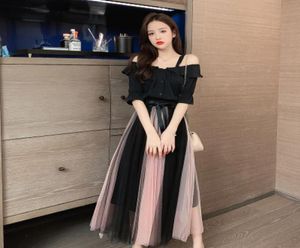 Zomer Koreaans Black Off Shoulder Shirt Twee -delige Gaze geplooide rokken sexy outfits schuine nek plus size kleding voor dames1570590