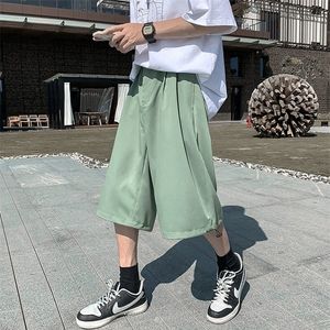 Zomer Koreaanse mode calflength broek mannen Harajuku harem broek losse knop vlieg zwart kaki groen joggers 210412