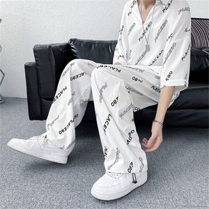 Zomer lichtgewicht 2 stuks sets voor mannen Koreaanse mode gotische kleding tieners hiphop streetwear satijn t shirt rechte been broek 220621