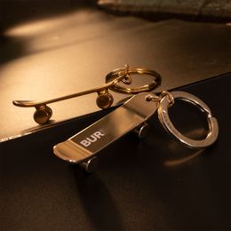 Bernes de luxe de luxe Salate Skateboard Designer Keys Kelechains Kens Womens Car Keychain Handmade 18K Gold Metal 2024 Nouveaux accessoires de bague clés
