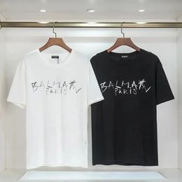 Impression de marque de luxe d'été T-shirts hommes femmes tson tshirt hip hop mode de streetwear surdimensionné Tops Enfants 240430