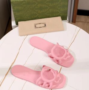 Zomer luxe designer slippers vrouwen platte hakken zoete snoep sandalen gevulkaniseerde holle mode feestschoenen