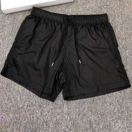 Été Hommes Nylon Shorts De Bain Créateur De Mode Gentleman Poches Latérales Swimear Garçon Fermeture À Glissière Poche Arrière Tonal Cordon Court Pantalonk68m