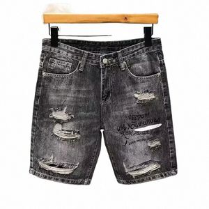 Pantalones cortos de mezclilla desgastados de verano para hombres Pantalones cortos de pantalones vaqueros sueltos con estampado de letras con agujeros informales T3YY #