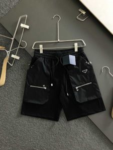 Zomer heren multi-pocket metalen casual cargo losse shorts, losse trend fashion sportshorts, alle zakken zijn praktisch en handig, sport cargo wind.