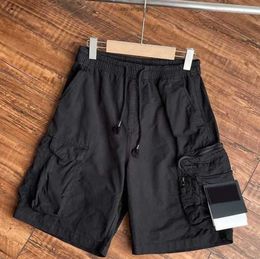 Pantalones de verano para hombre Pantalones cortos para hombre Stones Island Designers Insignia de carga Parches Pantalones de chándal Pantalones deportivos 2023ss Overol de bolsillo grande Pantalones Hombre Tidal flow design566es