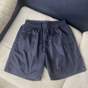 été hommes shorts designer shorts hommes femmes métal triangle graphique pantalons de plage mode décontracté cordon de serrage respirant pantalons de survêtement