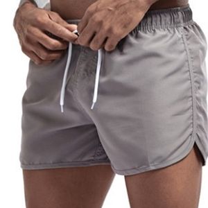 Été hommes Shorts séchage rapide hommes décontracté court pantalons de survêtement Fitness gymnases plage survêtement mâle respirant marque solide 210714