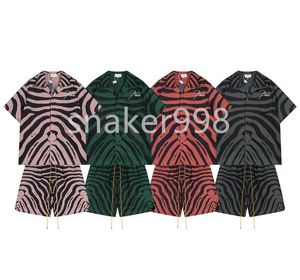 2024 Zomer Nieuwe heren PoloS Designer Rhude Fashion Letter Borduurwerk Casual shirt losse print Hawaiiaanse stijl korte mouwen strandbroek shorts heren dames paar set