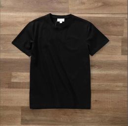 Créateur de hommes T-shirt de qualité courte à manches à manches à manches courtes hommes et femmes t-shirts à t-shirts Modèles de luxe coton hommes Hip Hop Vêtements polo Tshirt