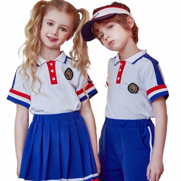 Été Nouveaux enfants Uniformes scolaires à manches courtes 2PCS Vêtements de sport Chemise pour filles avec jupes plissées Chemise pour garçons avec shorts p7mB #