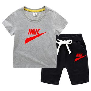 Été nouveaux enfants T-shirt Shorts enfants à manches courtes en coton T-shirt pantalon survêtement garçons et filles vêtements de bébé ensemble décontracté deux pièces