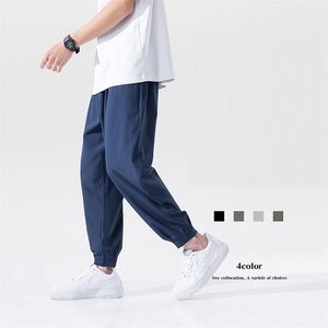 Été nouvelle mode coréenne ample Harem Joggers décontracté hommes léger confortable Cool décontracté cheville longueur pantalon 4XL 5XL 210412