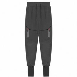 Pantalon de marque Fi pour hommes, nouveaux pantalons de survêtement décontractés avec pieds cordés, élastiques, multi-poches, sport, jogging, s1ec #