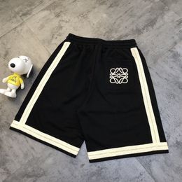 Été nouveau couture ruban rayé Sports simples shorts décontractés pour hommes pantalons de cinq points de plage de fabrication européenne masculine