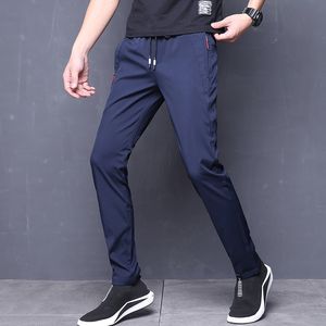 Pantalones de verano para hombre delgado estiramiento coreano coreano holguras casuales delgado ajuste chino elástico cintura jogger vestido pantalones masculino negro azul sh190915