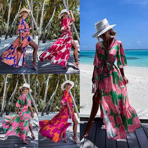 Zomer geprinte jurk insloeg vakantie vakantie losse halve mouw strand voor vrouwen
