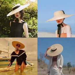 Été Raffia Femmes Long Ruban large Brim Place Chapeau français Style français Vintage Sunreen Big Natural Wheat Straw Hats Girl Bow Cap 240325