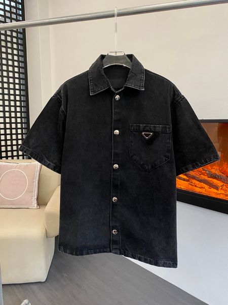Camisa de mezclilla para hombre de estilo retro de verano Diseño de un solo pecho Tamaño europeo Versión suelta de camisa de manga corta informal de diseñador de marca de lujo
