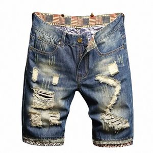 Pantalones cortos de mezclilla rasgados de verano Jeans para hombres Cinco cuartos Tamaño suelto Pantalones medianos Fi Marca Persality Beggar 92ED #