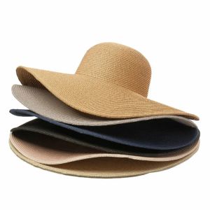 20 -stcs/lot zomer eenvoudige floppy zon hoed vrouwen brede riem strandmuts meisjes kustvouwbare riethoed zonnebrandcrème bescherming dame cap