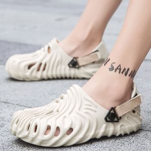 Zapatillas de verano hombres mujeres al aire libre al aire libre sandalias de fondo suave de fondo redondo tendencia de la tendencia de los pies de la cara zapatillas de playa ligeras en casa gran tamaño