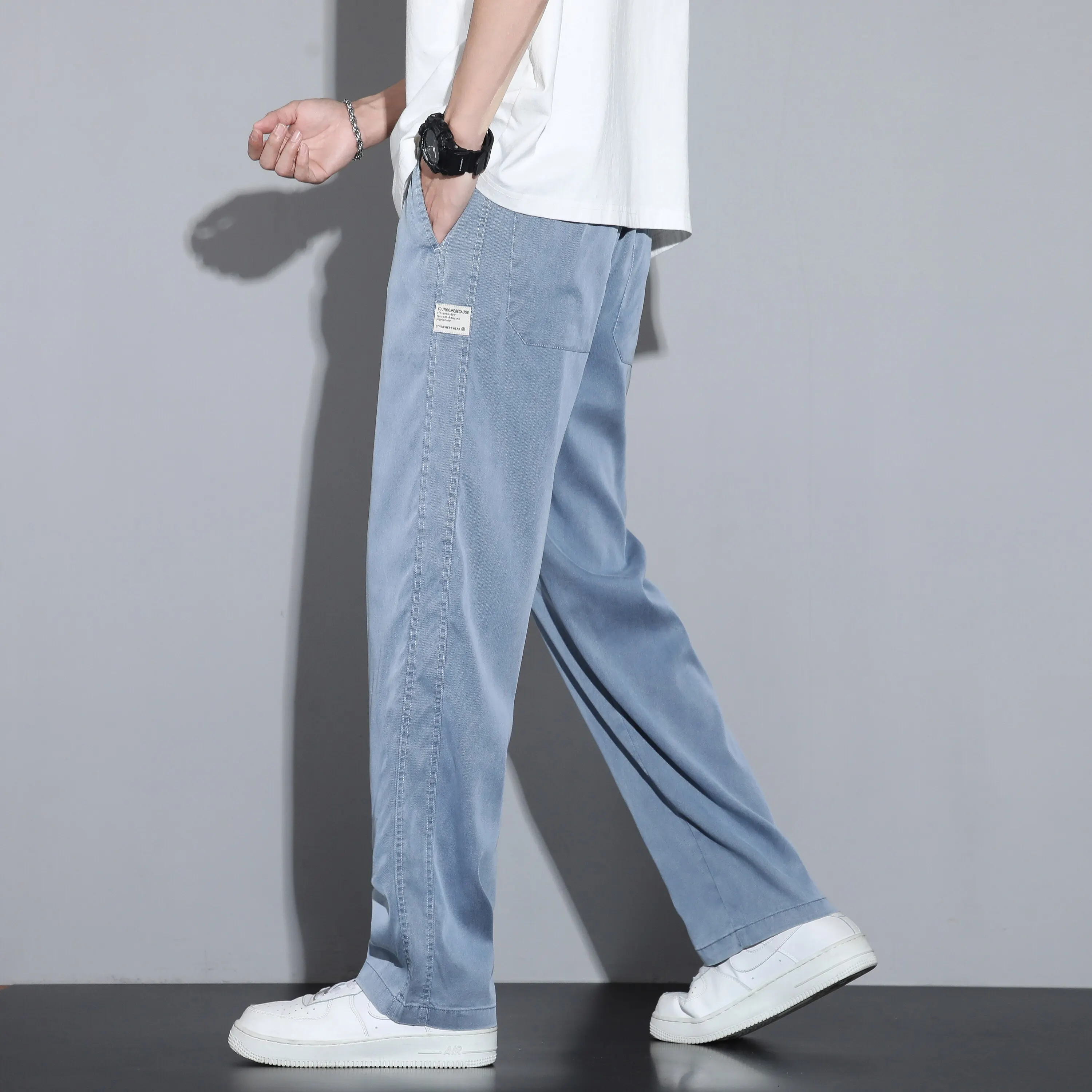Summer Soft Lyocell Fabric Męskie dżinsy cienkie luźne proste spodnie sznurka elastyczna talia Korea Casualne spodnie Plus M-5xl