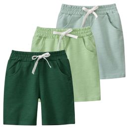 Couleurs solides d'été shorts sportifs pour garçons Vêtements pour enfants Taies élastiques Pantalons courts Cotton Kids Tenues 240328