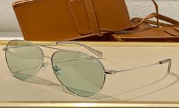 Lunettes de soleil d'été pour les hommes Style des femmes 40062 Antiultraviolet Retro Plate des lunettes de mode ovale en plein trame aléatoire1063632