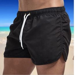 Trunks de natation d'été Sport Gym de course shorts masculins plage de plage de luxe Plage rapide Dry Mens Siwmwear Brops Briefs 240403