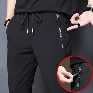 Été mince hommes pantalons de sport hommes décontracté coréen élasticité pieds séchage rapide droite marque costume d'affaires pantalon 210715