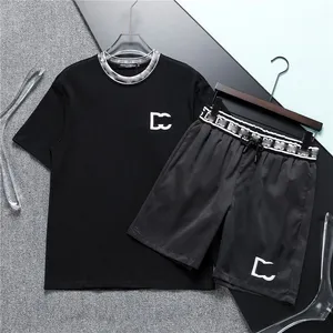 Survêtements d'été Marque impression costume à manches courtes pour hommes fitness mode loisirs sports super cool T-shirt noir short 2 pièces ensemble # 002 EXUA