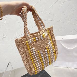 Zomer dames schoudertassen reis handtassen mode 3 kleuren breien strandtas vintage hoogwaardige kralen designer handtas