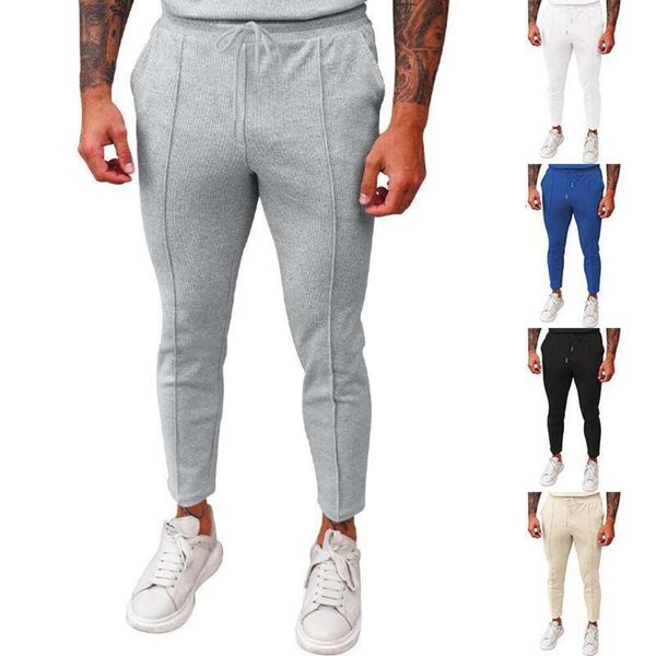 Pantalones casuales de lujo de encaje de gofres de verano con pies pequeños para hombres