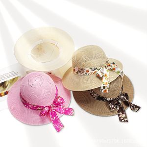 Summer Brim Bowknot Straw Sun Chapeaux pour femmes Mesdames Long Ruban Floral Défilé Défense de voyage Hat de plage Protection Panama Caps HCS359