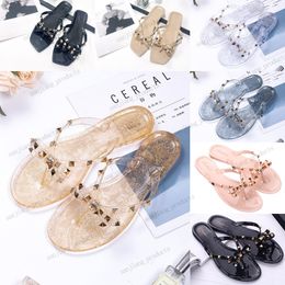 Summer Women Beach tongs Chaussures Classic Quality Damesdddad Ladies Cool Bow Knot Flat Designer Slipper Femme Rivet Jelly Sandals Chaussures Cool Beach Slides Chaussures Jelly