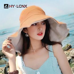 Été femmes pliable coton respirant en plein air mode pêcheur avec grand bord réglable couleur unie soleil seau chapeau 220627