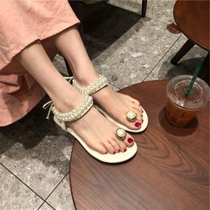 Été femmes sandales mode diamant perle mot boucle sangle coréen fond plat sauvage décontracté chaussures de plage promotions